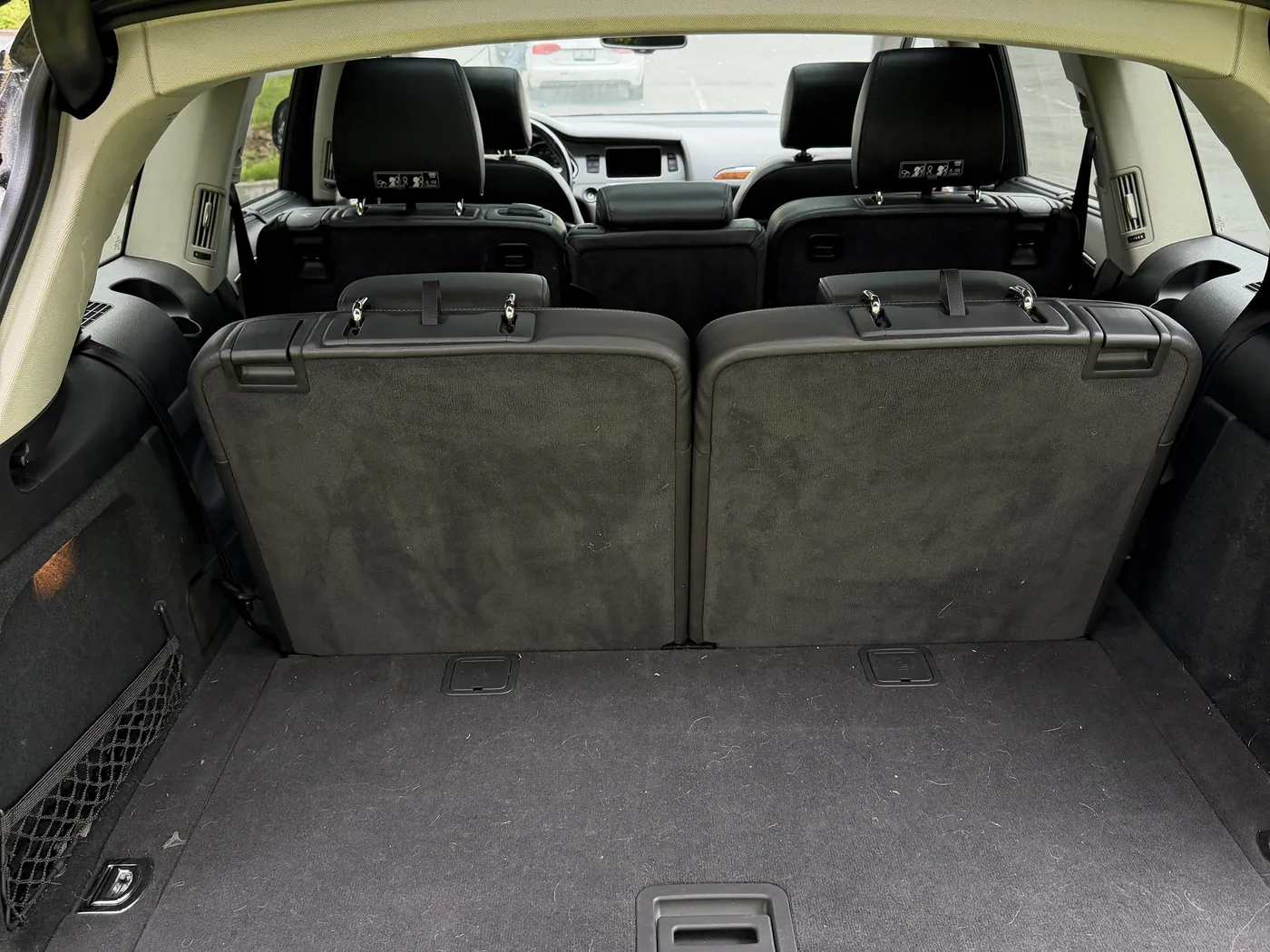 Trunk before deep cleaning — dusty and dirty